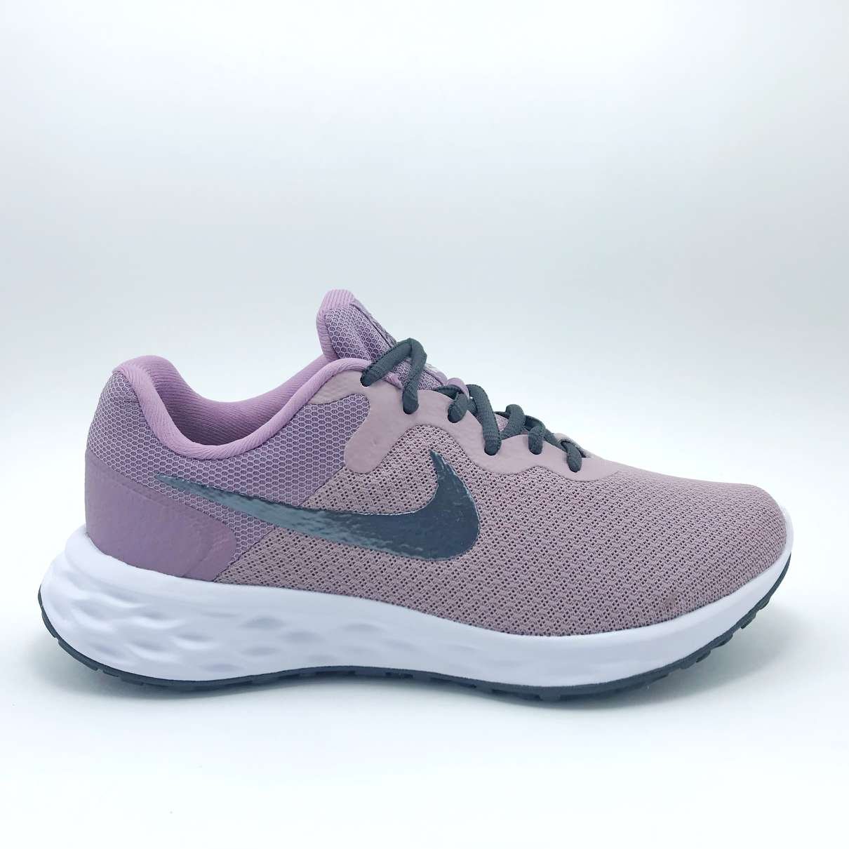 Nike best sale revolution feminino