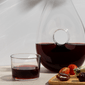 Red wine carafe and glass arrangement