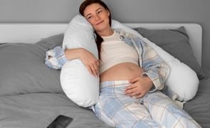 high angle pregnant woman relaxing home 1