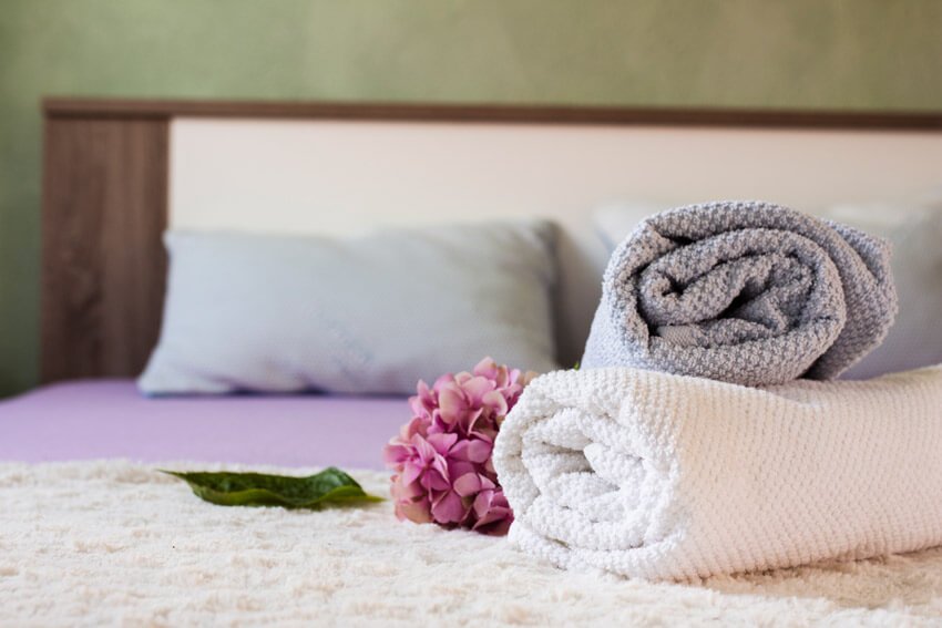 arrangement with towels flower bed